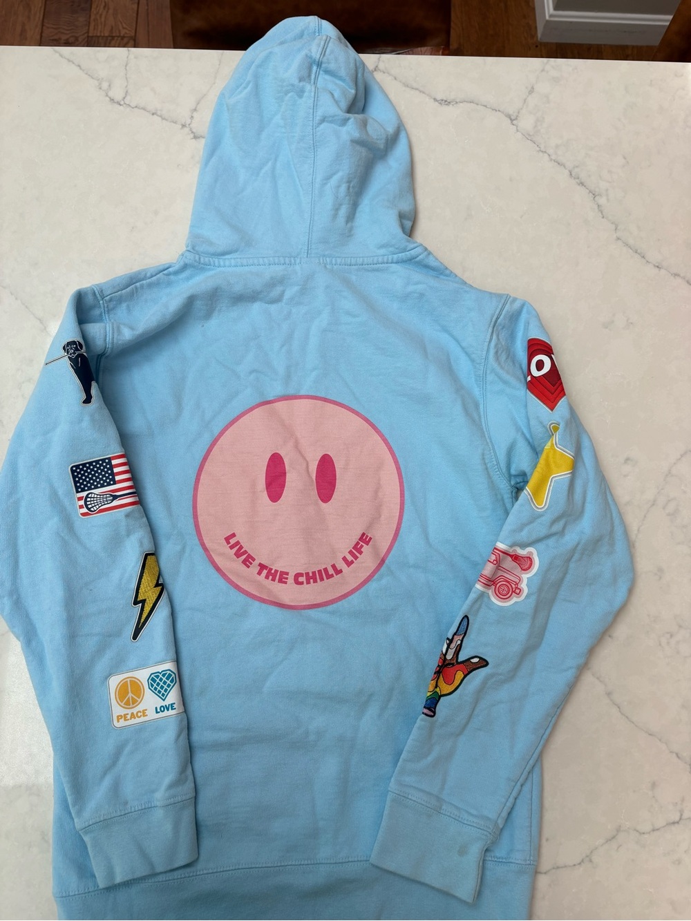 Lacrosse Light Blue Hoodie with Pink Smiley Graphic - Live The Chill Life